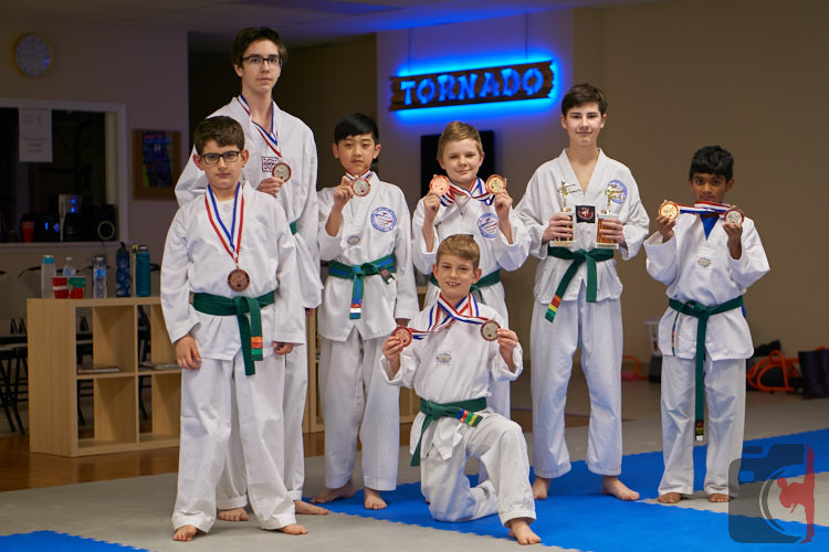 martial arts champions with medals